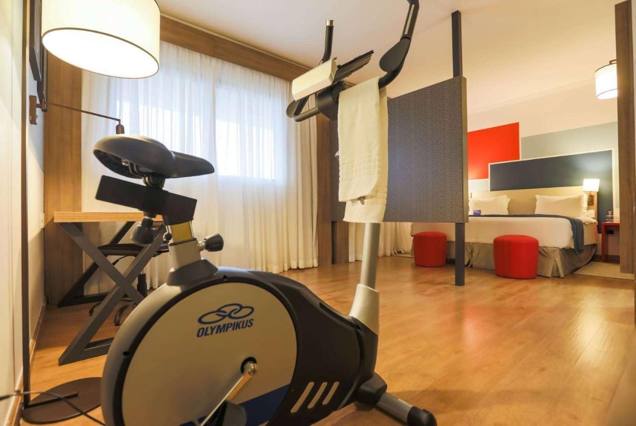 Tryp By Wyndham Ribeirao Preto Otel Dış mekan fotoğraf An exercise bike in a hotel room
